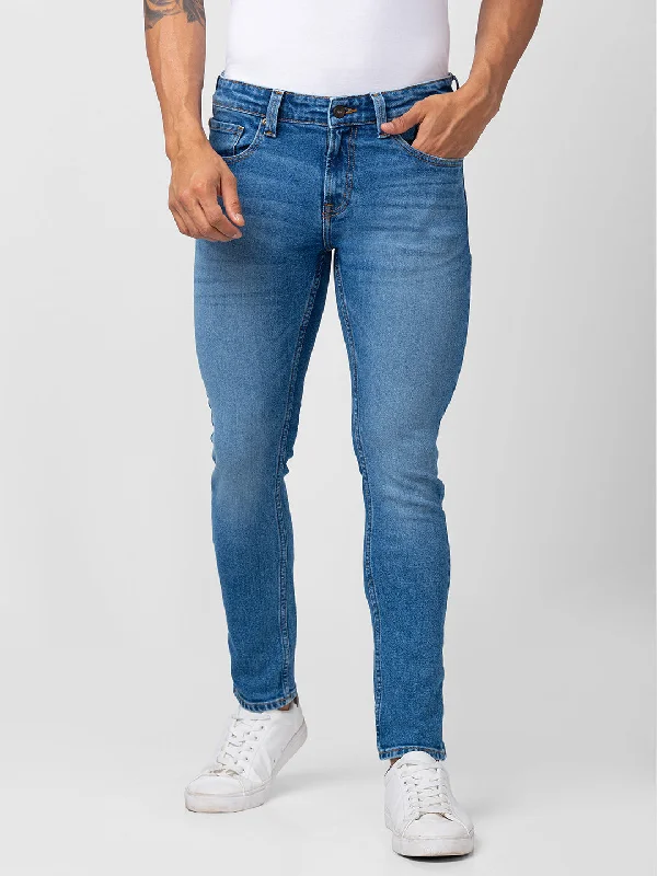 Distressed Jeans for Edgy Style -Spykar Men Mid Blue Cotton Stretch Super Slim Fit Tapered Length Jeans (Super Skinny)