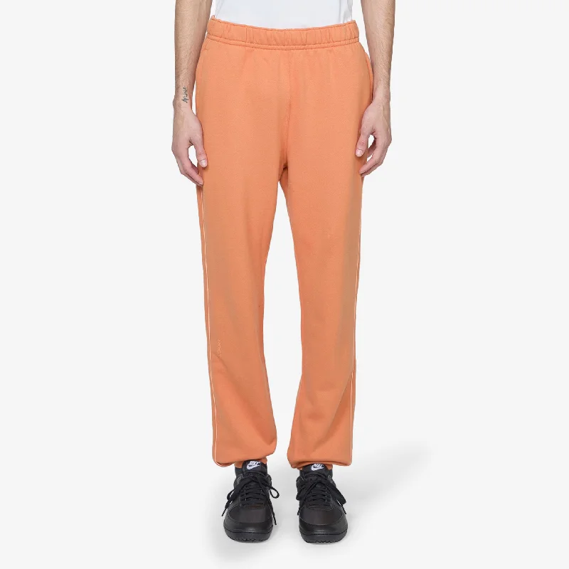 Tapered ankle pants for sleek modern silhouettes -NOCTA Fleece Pant Hot Curry | Orange Trance | Orange Trance