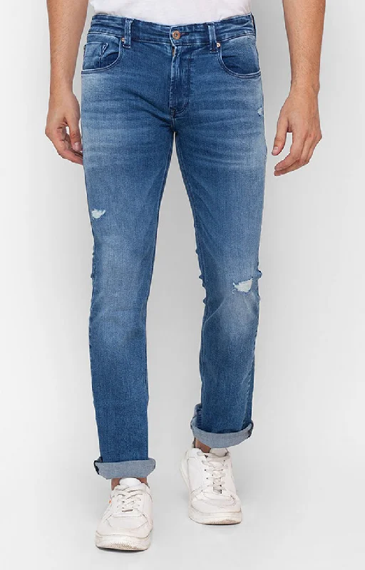 Distressed Jeans for Edgy Style -Spykar Mid Blue Cotton Comfort Fit Regular Length Jeans For Men (Rafter)