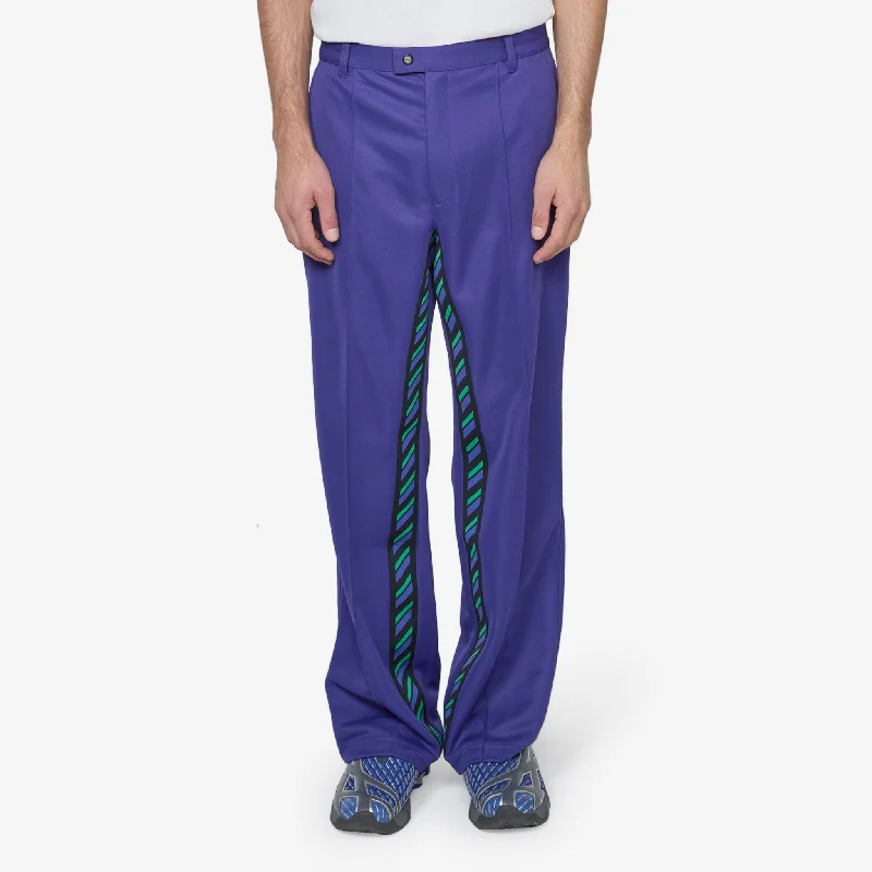 High-performance ski pants for snowy mountain slopes -ASICS NOVALIS Styrax Track Pants Asics Blue